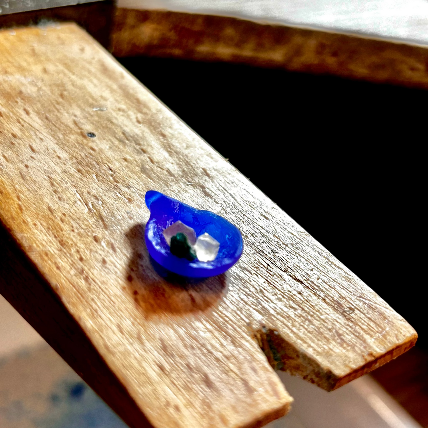 Wax version of the pendant with raw stones, additional detail view