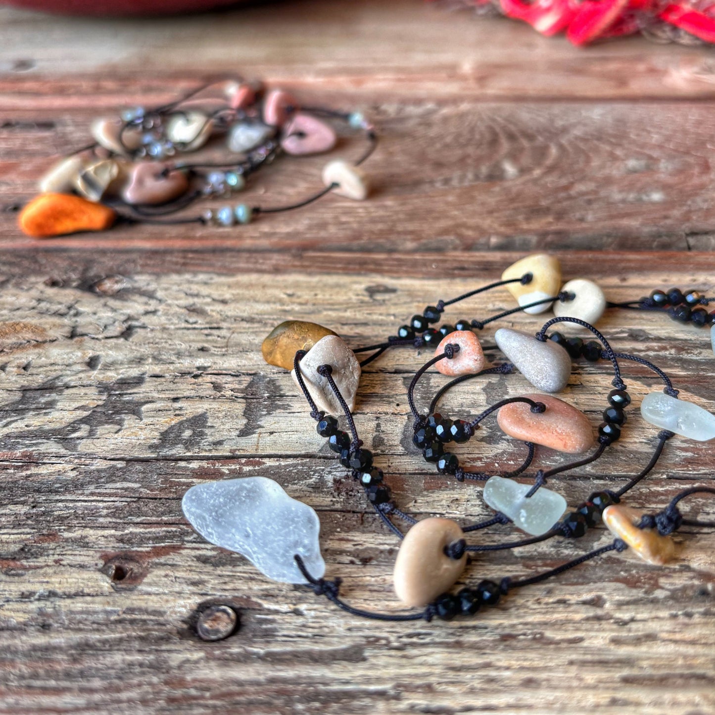 Necklace with natural elements on a wooden surface