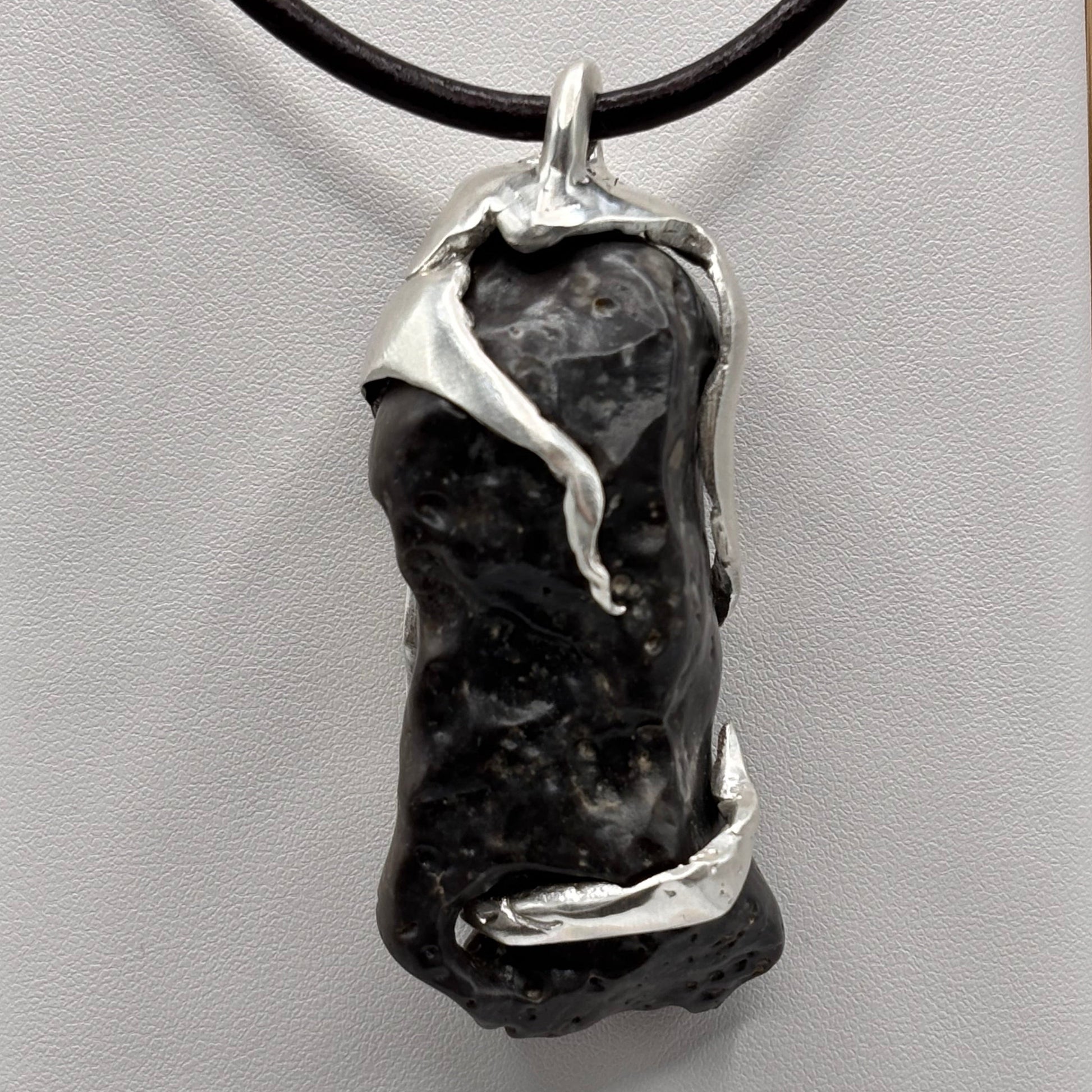 Leviathan pendant necklace, raw black stone in sterling silver, handmade 7ajra jewelry.