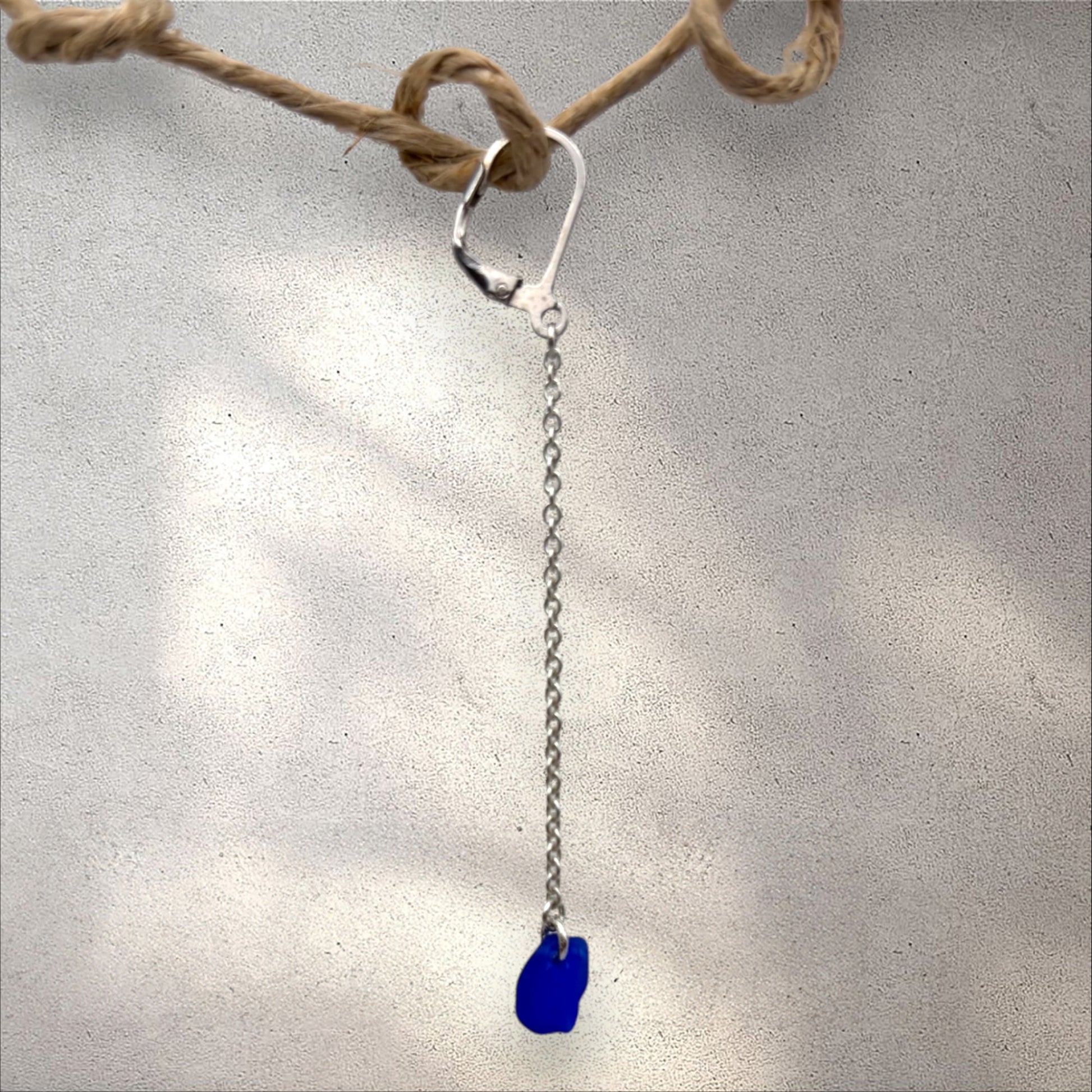 Azure earring, blue sea glass on silver chain.