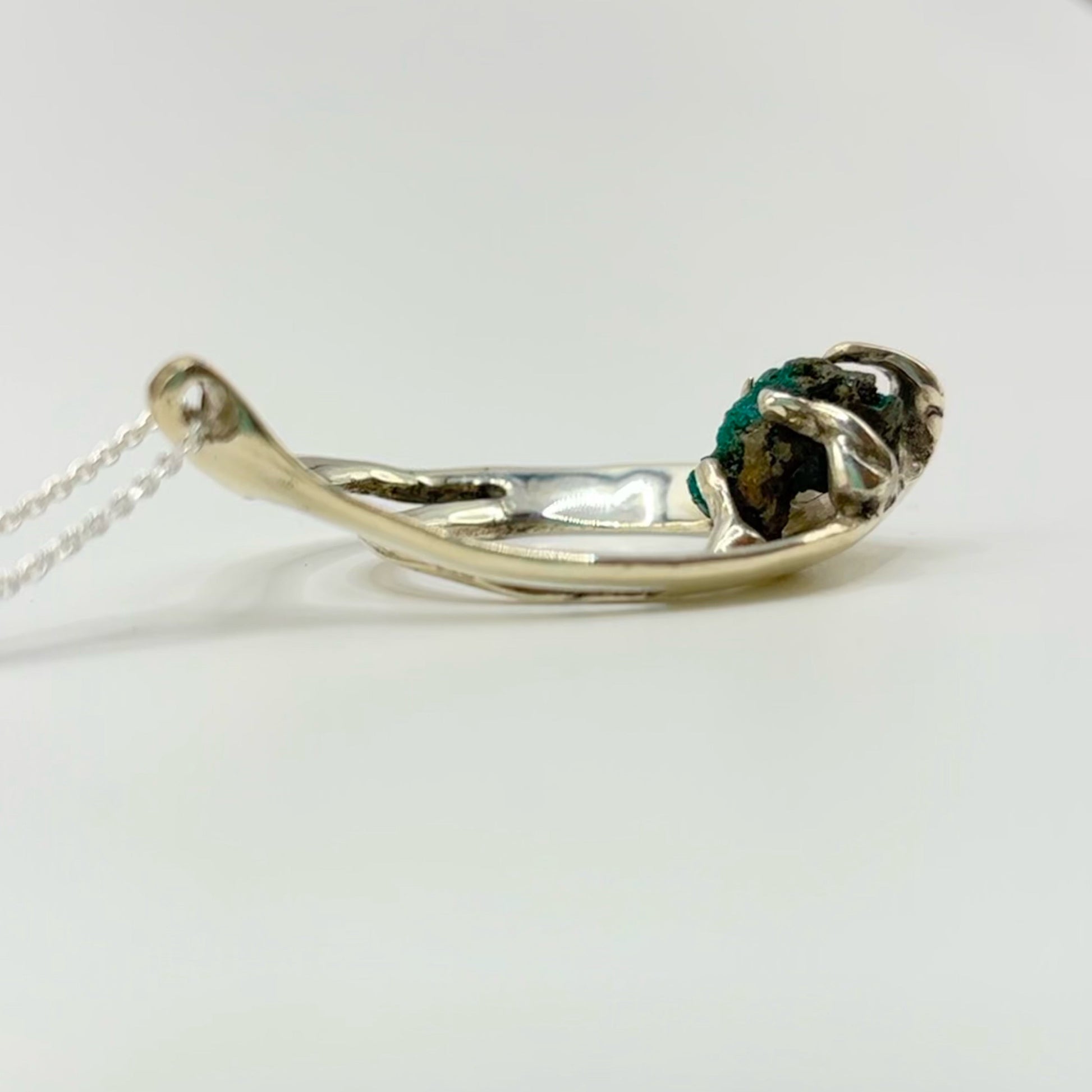 Cori necklace with raw dioptase stone pendant in silver.