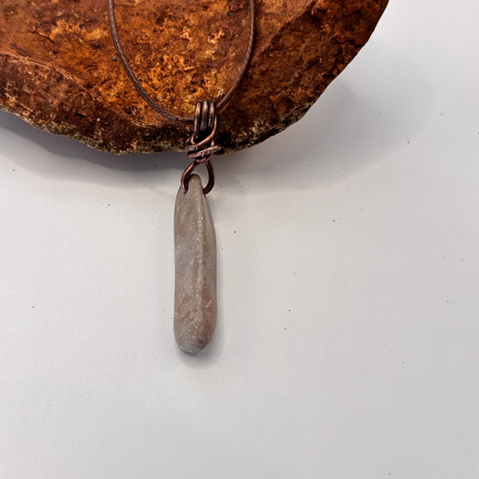 Necklace with a pendant on a white background