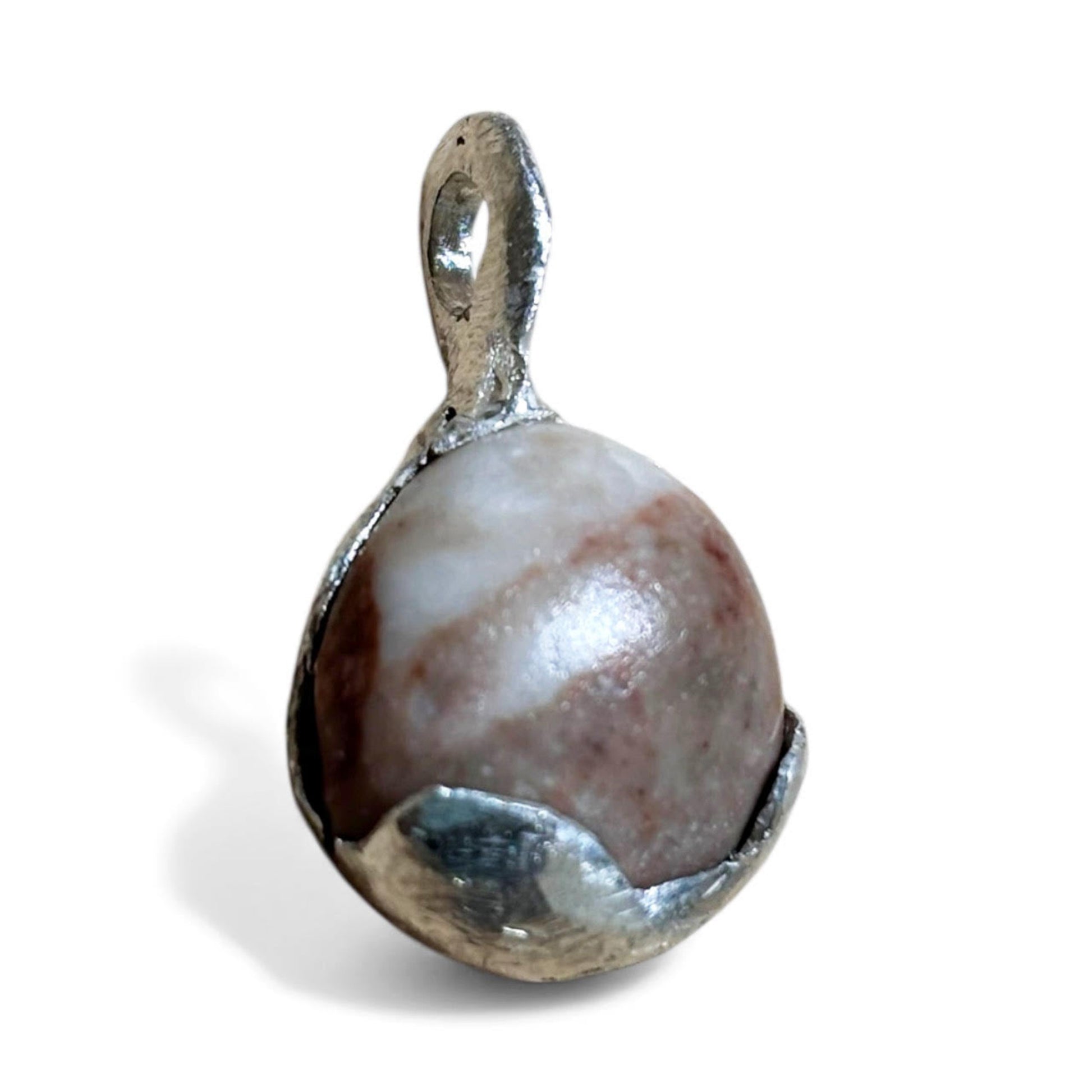 Pendant with a stone and silver setting on a white background