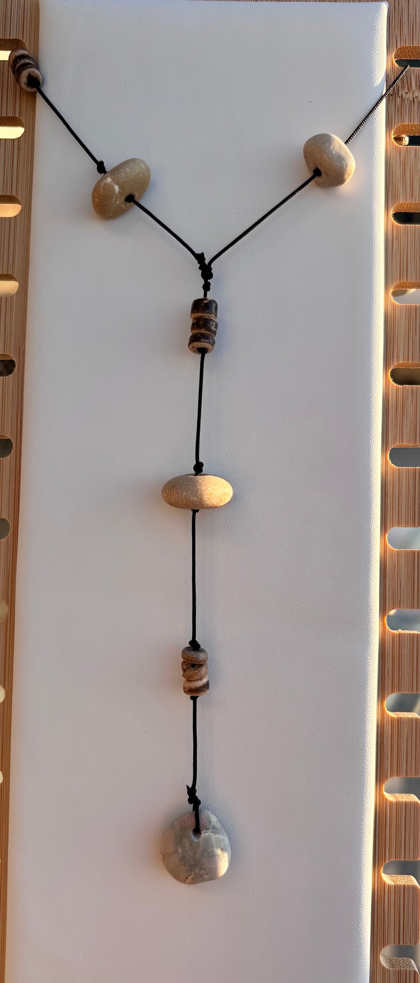 Necklace with wooden beads on a white background