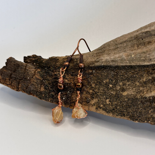 Close-up of raw calcite wire wrapped earring detail