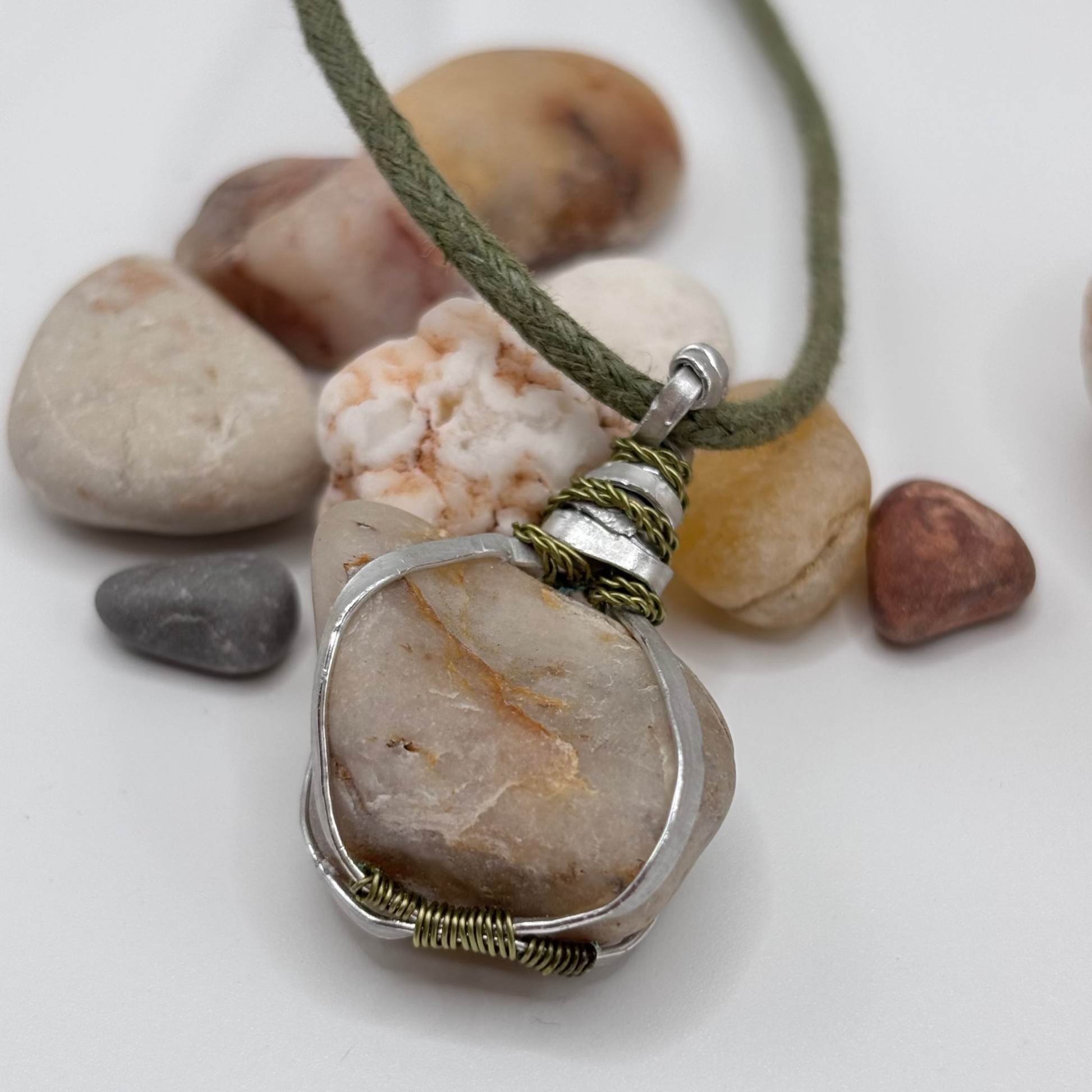 Raw stone from Aegean Sea shore wrapped in aluminum wire pendant