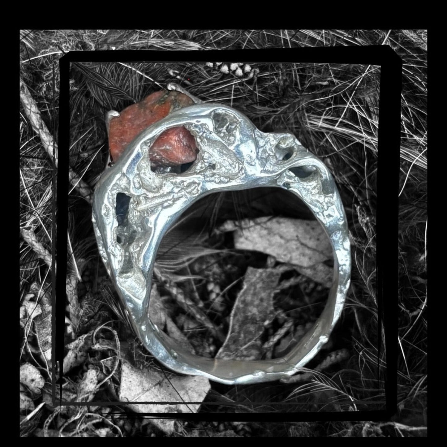 Detail shot of the raw stone in its silver setting